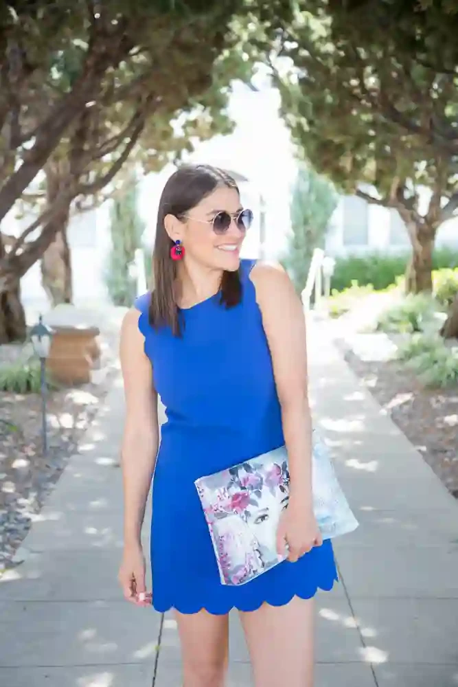 A woman in a blue dress. A woman in a blue dress.