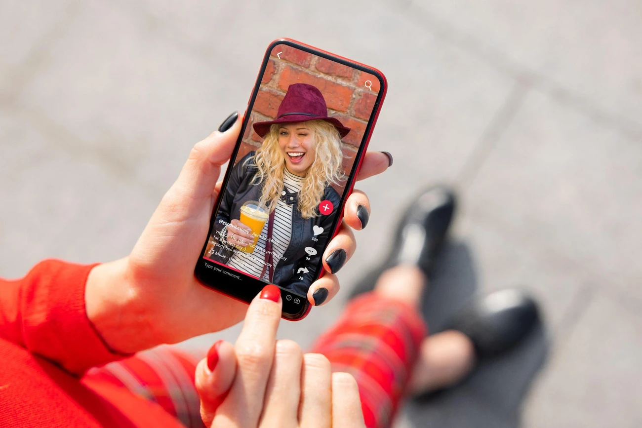 A girl scrolling tiktok reels.