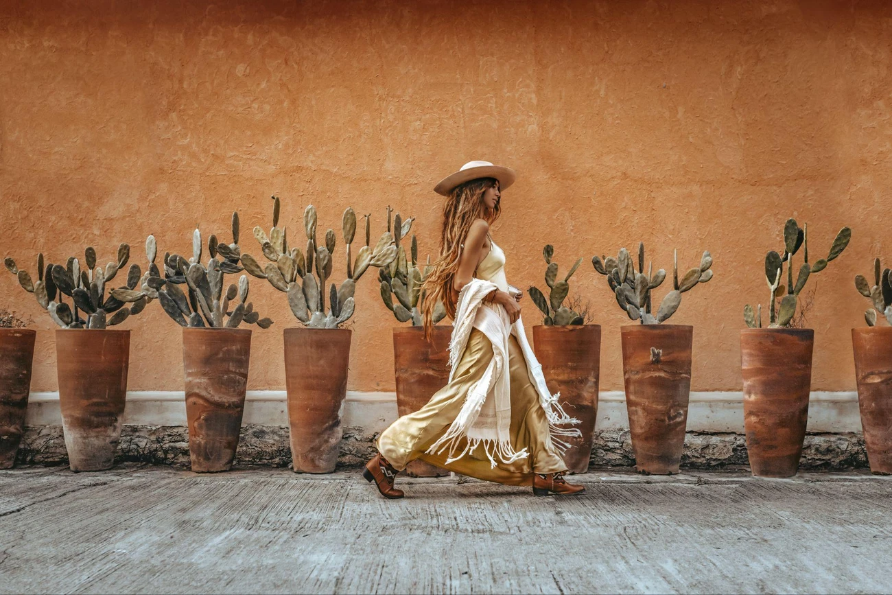A girl walking the road in boho style
A girl walking the road in boho style