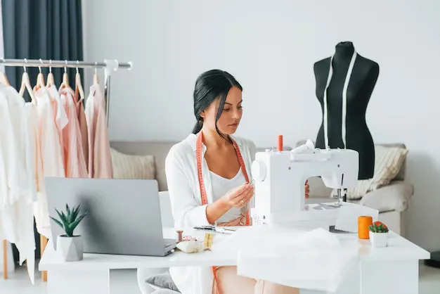 Student working on a sewing machine